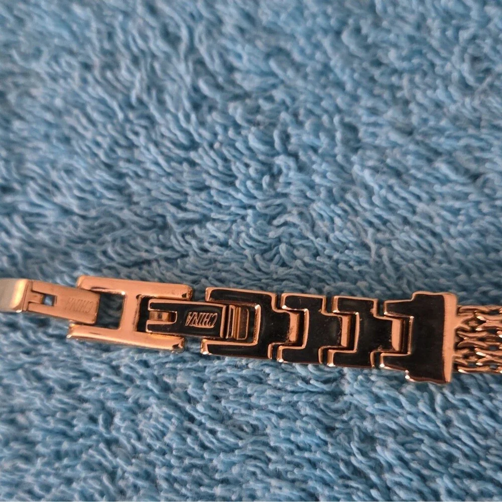 Gold Tone Mesh Chain Bracelet with Clear X Pavé Accent, Fold Over Closure